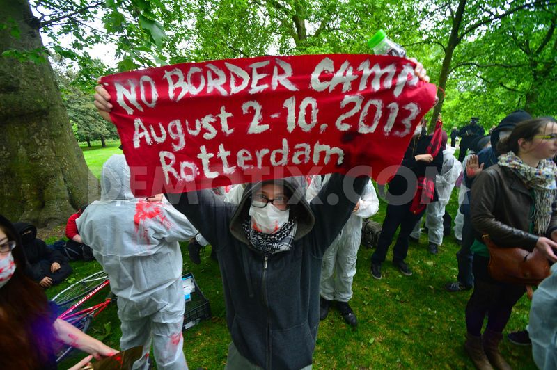 1371192192-no-borders-protest-held-outside-g4s-during-london-g8-week-of-protests_2150316