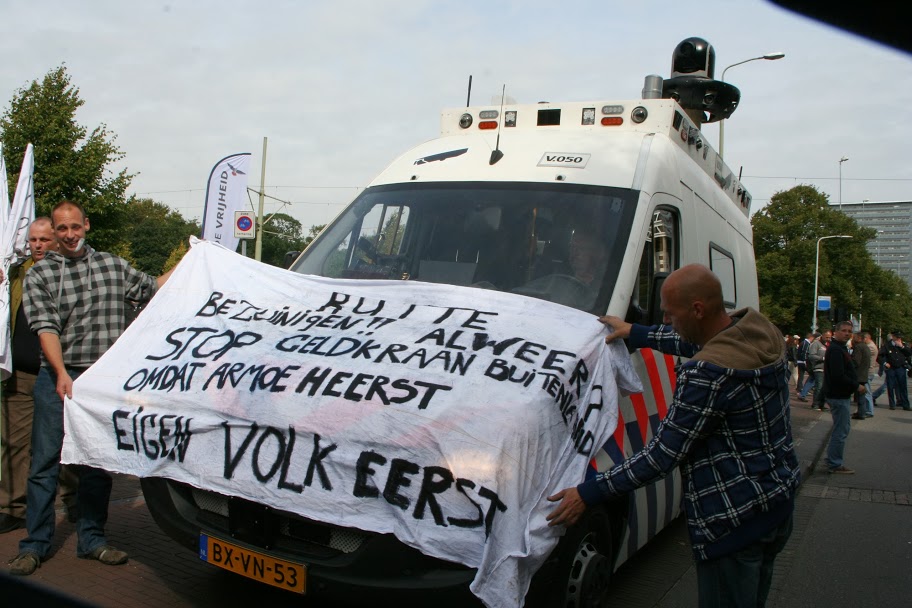 Banner with text, “Own People First”